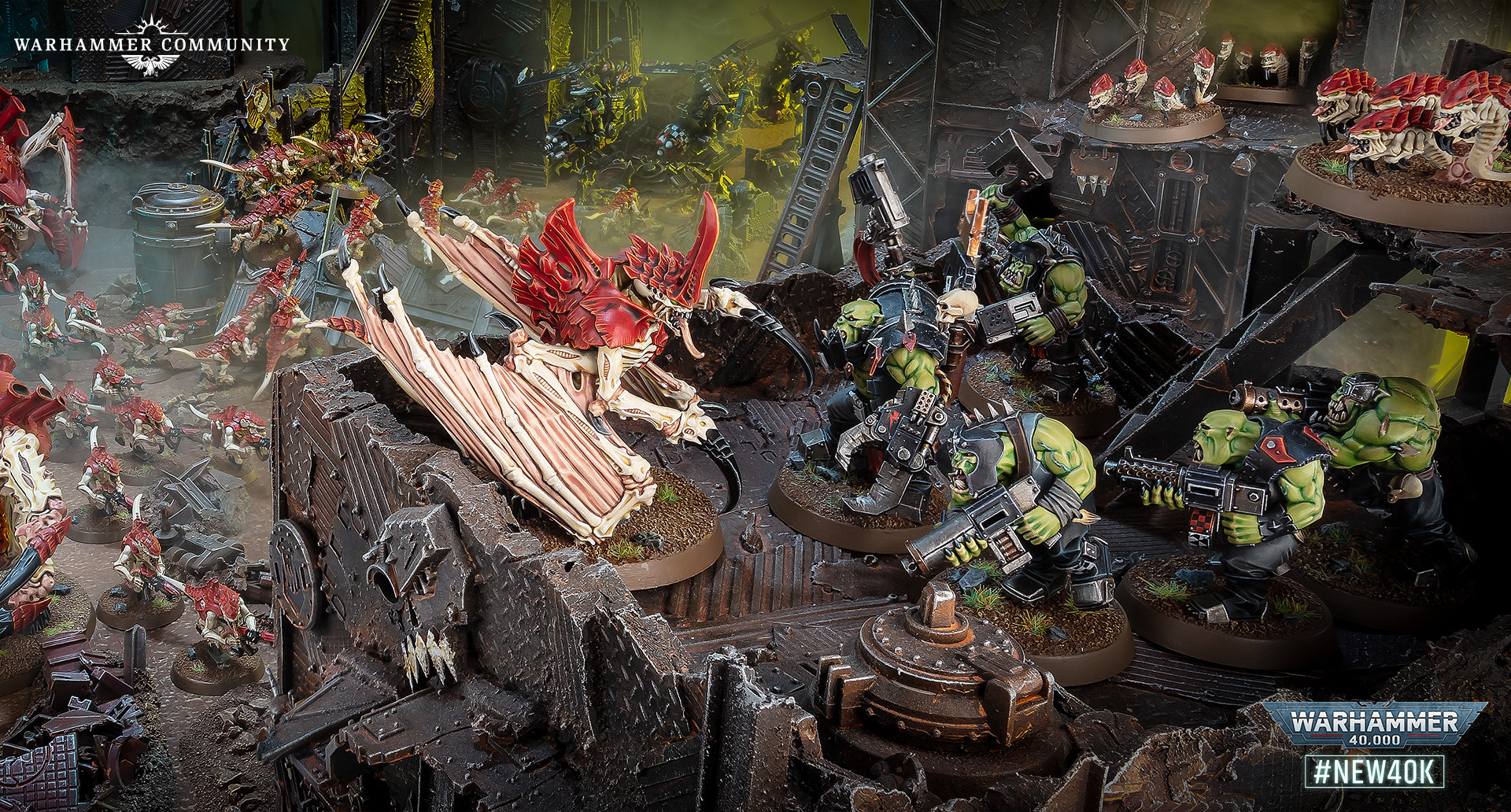 Blood Angels fighting Orks across ruined Armageddon terrain in 40K