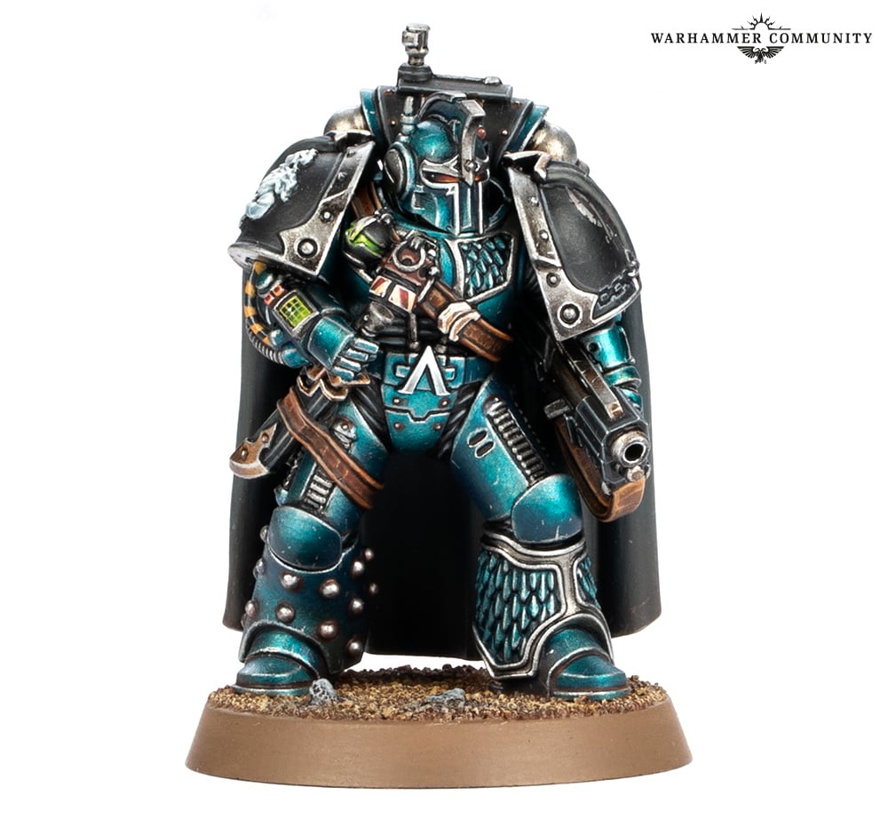 An Alpha Legion Saboteur in hooded artificer armour with a shrouding cloak and pistol