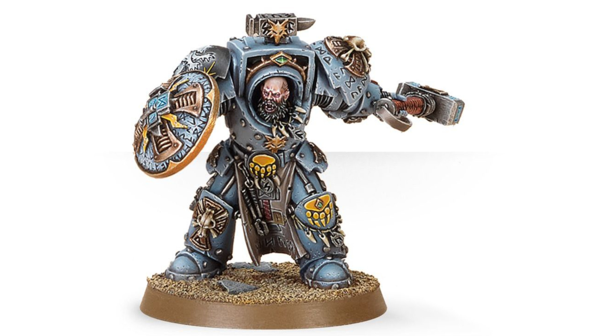 The earlier Arjac Rockfist miniature, holding Foehammer out to one side with his Anvil Shield raised