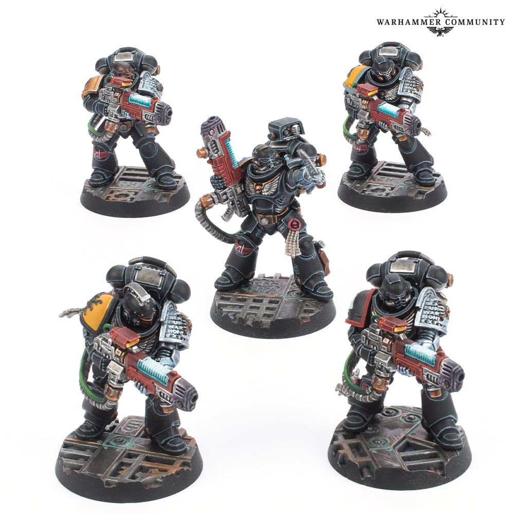 A five-man Deathwatch kill team, black armour and silvered gauntlets, each from a different Chapter