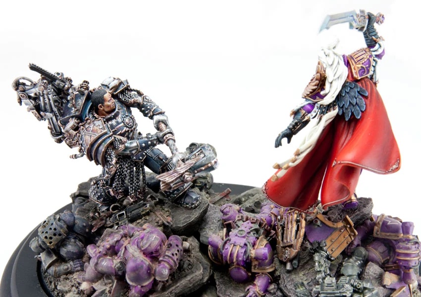 Fulgrim standing over the headless corpse of Ferrus Manus