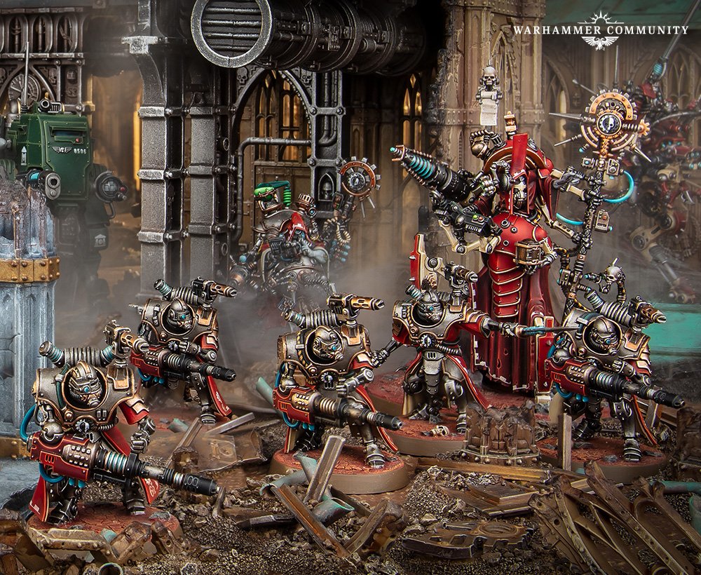 Skitarii and an Archmagos in the ruins of a Mechanicus forge district