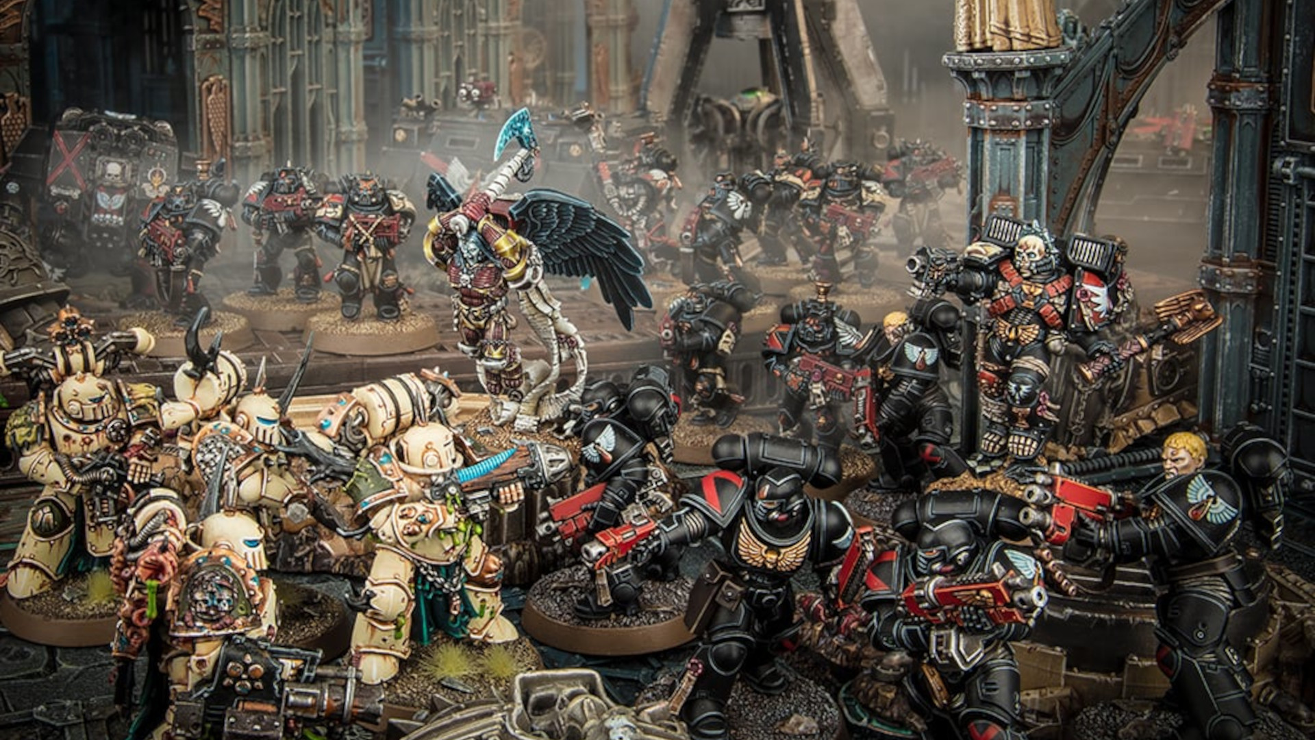 Blood Angels Death Company with jump packs and a winged banner wading into a ruined battlefield