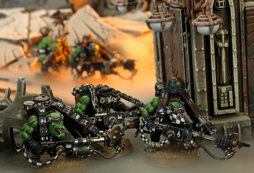 A squad of Ork Burna Boyz miniatures with their flamer weapons, one of the units losing its standalone datasheet in the new Codex: Orks
