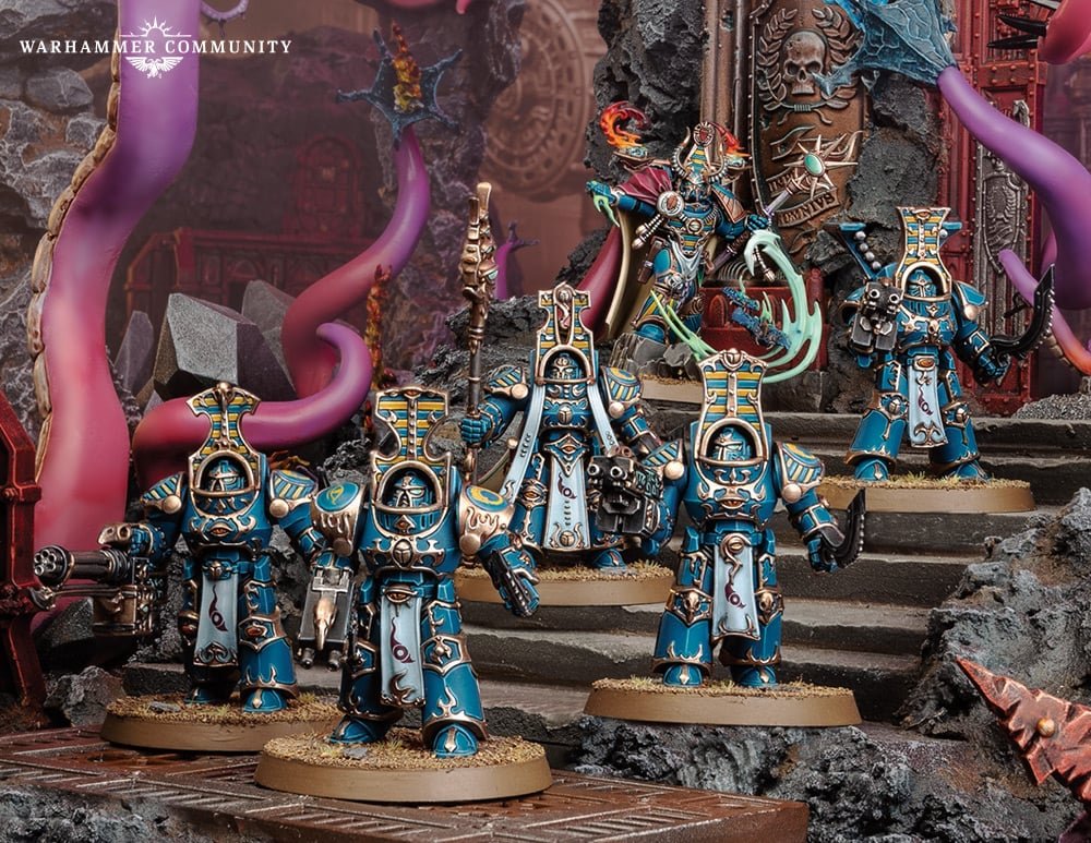 Thousand Sons Scarab Occult Terminators in blue and gold power armour advancing